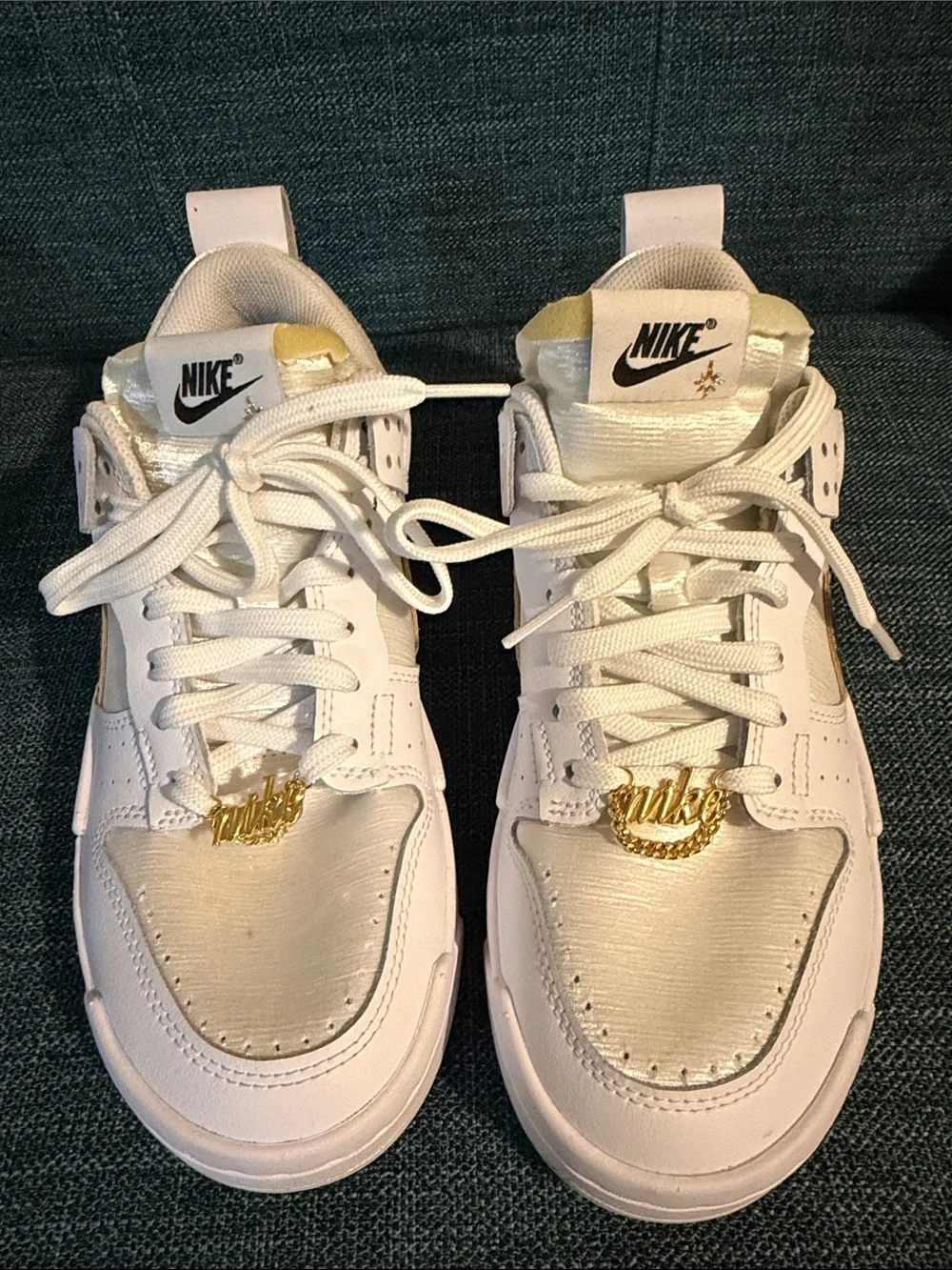Nike Women’s White and Gold Low-Top Sneakers with Metallic Swoosh